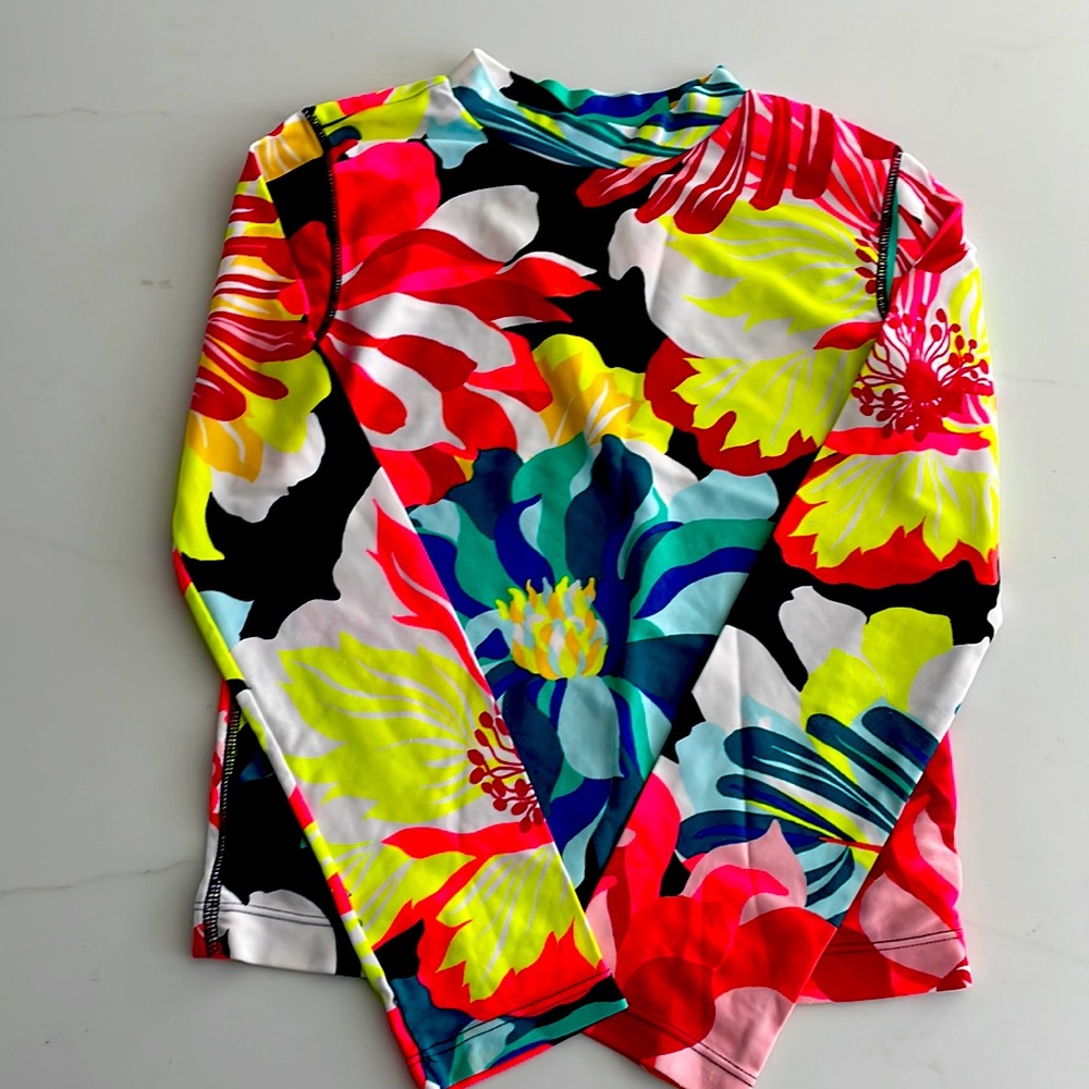 Gap Kids Girls Multi-floral long sleeve rashguard.